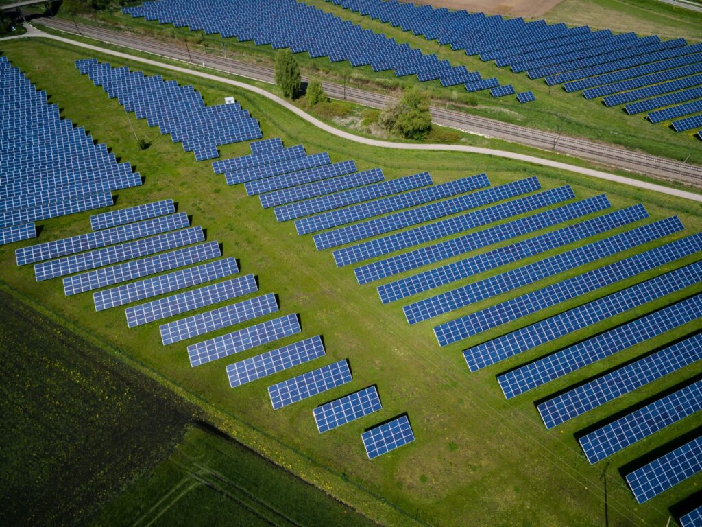 Large-scale solar panel farm representing renewable energy projects supported by the top 10 solar companies in Kerala