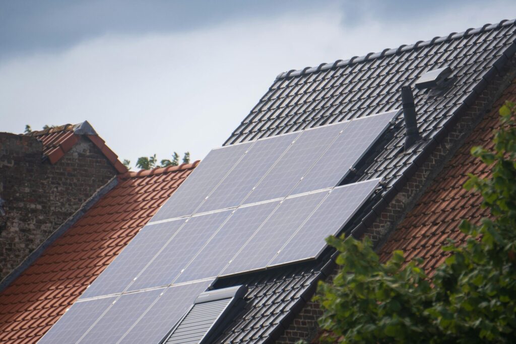 Residential rooftop solar panel installation by solar companies in Ernakulam designed for efficient energy generation and smart solar system performance monitoring.